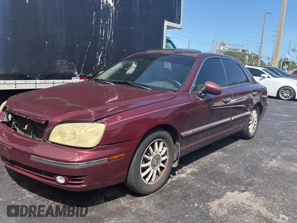 2005 Hyundai XG z VIN KMHFU45E95A381631, wystawiony jako Copart lot #57705005 z przebiegiem 202 730 mil mil oraz Tytuł czysty. Historia ofert i sprzedaży dostępna na DreamBid. Obrazek 2.