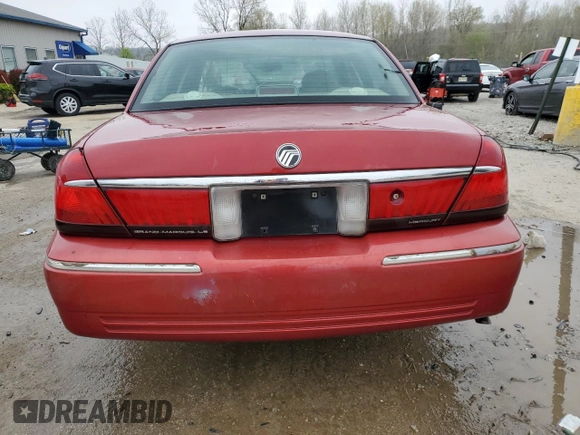 2000 Mercury Grand Marquis LS z VIN 2MEFM75WXYX726819, wystawiony jako Copart lot #52873675 z przebiegiem 144 692 mil mil oraz Nie do naprawy. Historia ofert i sprzedaży dostępna na DreamBid. Obrazek 6.