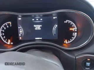 2014 Jeep Grand Cherokee Overland with VIN 1C4RJFCG9EC299235, listed as a IAAI auction lot 41670065 with 108,589 mi miles and . Bid and sale history available at DreamBid. Image 7.