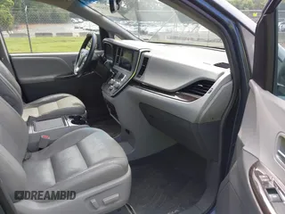 2016 Toyota Sienna XLE z VIN 5TDYK3DC0GS766059, wystawiony jako IAAI lot #42214738 z przebiegiem 143 001 mil mil oraz . Historia ofert i sprzedaży dostępna na DreamBid. Obrazek 5.