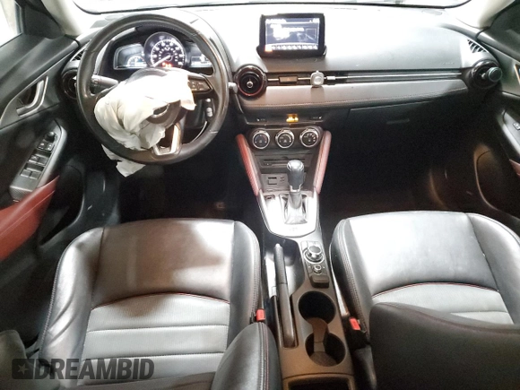 2018 Mazda CX-3 Touring z VIN JM1DKFC75J0301307, wystawiony jako Copart lot #56302175 z przebiegiem 107 676 mil mil oraz Szkoda całkowita • Salvage title. Historia ofert i sprzedaży dostępna na DreamBid. Obrazek 8.