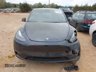 2024 Tesla Model Y with VIN 7SAYGDED3RA303113, listed as a IAAI auction lot 41915760 with 12,917 mi miles and . Bid and sale history available at DreamBid. Image 11.