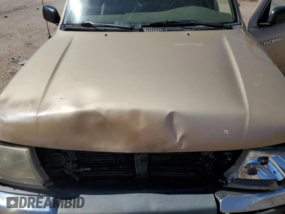 1999 Toyota Tacoma with VIN 4TAWN72N4XZ560411, listed as a Copart auction lot 61499925 with 395,215 mi miles and Salvage title. Bid and sale history available at DreamBid. Image 11.