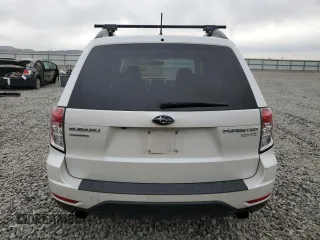 2013 Subaru Forester X Limited с VIN JF2SHAFC2DH432221, выставлен на аукционе Copart как лот 52303335 с пробегом 164 009 миль миль и Списание • Salvage title. История ставок и продаж доступна на DreamBid. Изображение 6.