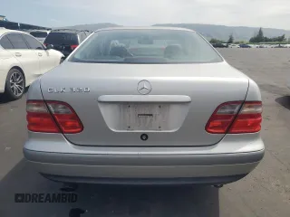 1999 Mercedes-Benz CLK 320/430 z VIN WDBLJ65G5XF100670, wystawiony jako Copart lot #55385595 z przebiegiem 126 985 mil mil oraz Czysty tytuł • Clean title. Historia ofert i sprzedaży dostępna na DreamBid. Obrazek 6.