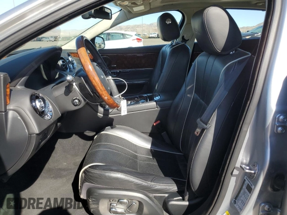 2015 Jaguar XJ with VIN SAJWA2GZ4F8V90853, listed as a Copart auction lot 72631114 with 59,237 mi miles and Salvage Title. Bid and sale history available at carsss.com. Image 7.