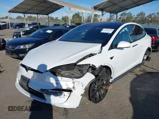 2022 Tesla Model X with VIN 7SAXCBE56NF329657, listed as a IAAI auction lot 41400629 with Not Provided miles and . Bid and sale history available at DreamBid. Image 6.