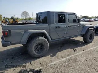 2021 Jeep Gladiator Sport z VIN 1C6HJTAG7ML507101, wystawiony jako Copart lot #54265865 z przebiegiem 42 781 mil mil oraz Szkoda całkowita • Salvage title. Historia ofert i sprzedaży dostępna na DreamBid. Obrazek 3.