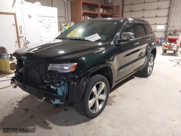 2014 Jeep Grand Cherokee Overland with VIN 1C4RJFCGXEC162109, listed as a IAAI auction lot 41943979 with 147,788 mi miles. Bid and sale history available at carsss.com. Image 23.
