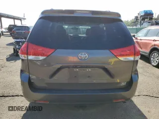 2014 Toyota Sienna Limited with VIN 5TDDK3DC8ES078175, listed as a Copart auction lot 61138585 with 98,527 mi miles and Salvage title. Bid and sale history available at DreamBid. Image 6.