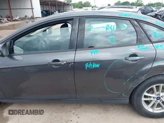2017 Ford Focus SE with VIN 1FADP3F23HL232809, listed as a IAAI auction lot 42117700 with 104,802 mi miles and . Bid and sale history available at DreamBid. Image 14.