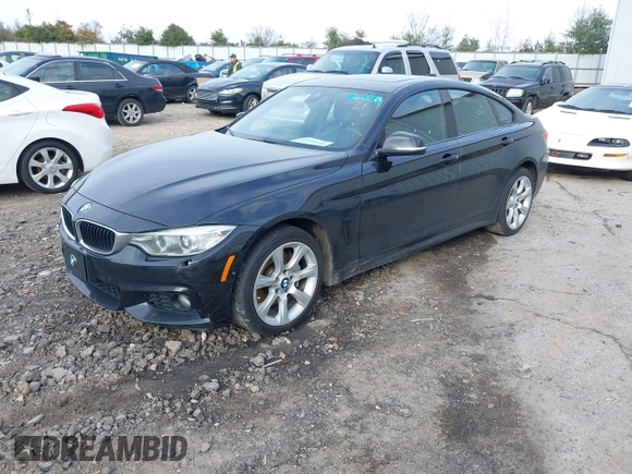 2016 BMW 4 Series 428i xDrive with VIN WBA4C9C52GG136584, listed as a IAAI auction lot 41530110 with 124,667 mi miles and . Bid and sale history available at carsss.com. Image 2.