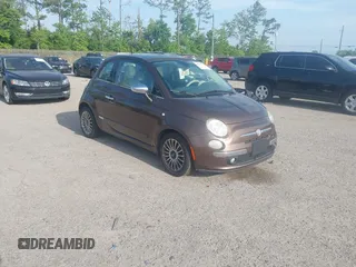 2012 FIAT 500 Lounge z VIN 3C3CFFCR5CT106416, wystawiony jako IAAI lot #42115342 z przebiegiem 147 742 mil mil oraz . Historia ofert i sprzedaży dostępna na DreamBid. Obrazek 1.