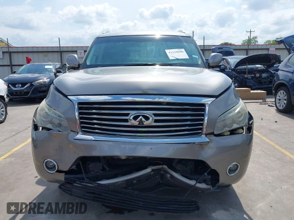 2012 Infiniti QX56 7-passenger z VIN JN8AZ2NF9C9517675, wystawiony jako IAAI lot #42138696 z przebiegiem 129 478 mil mil oraz . Historia ofert i sprzedaży dostępna na DreamBid. Obrazek 6.