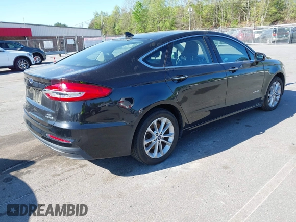 2019 Ford Fusion SEL with VIN 3FA6P0MU6KR252797, listed as a IAAI auction lot 41994504 with 106,029 mi miles and . Bid and sale history available at DreamBid. Image 4.
