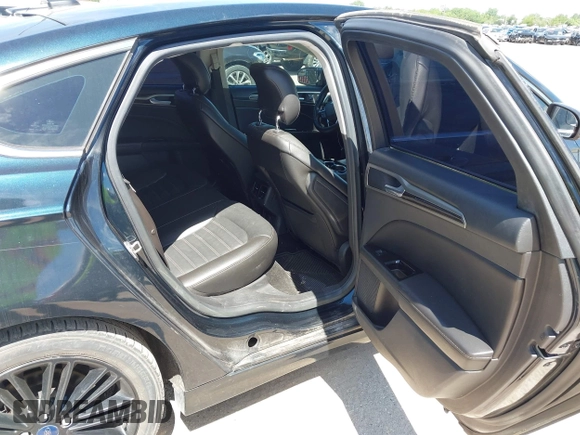 2014 Ford Fusion SE with VIN 3FA6P0H91ER298077, listed as a IAAI auction lot 42221110 with 244,165 mi miles and . Bid and sale history available at carsss.com. Image 8.