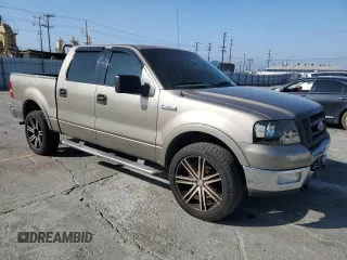 2004 Ford F-150 XLT with VIN 1FTPW14594KC36276, listed as a Copart auction lot 64606035 with 260,886 mi miles and Salvage title. Bid and sale history available at DreamBid. Image 4.