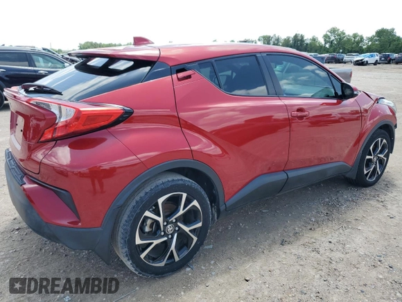 2021 Toyota C-HR LE with VIN JTNKHMBX0M1098199, listed as a Copart auction lot 56197565 with 33,119 mi miles and Salvage Title. Bid and sale history available at DreamBid. Image 3.