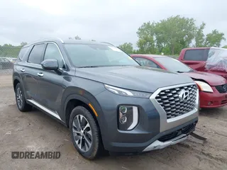2021 Hyundai Palisade SEL z VIN KM8R24HE4MU226030, wystawiony jako IAAI lot #42351940 z przebiegiem 55 045 mil mil oraz . Historia ofert i sprzedaży dostępna na DreamBid. Obrazek 1.