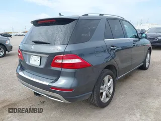 2014 Mercedes-Benz M 350 with VIN 4JGDA2EBXEA276400, listed as a IAAI auction lot 42430364 with 209,150 mi miles and . Bid and sale history available at DreamBid. Image 4.