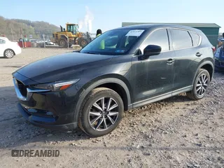 2018 Mazda CX-5 Grand Touring with VIN JM3KFBDM2J0463279, listed as a IAAI auction lot 42115309 with 68,851 mi miles. Bid and sale history available at carsss.com. Image 2.