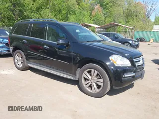 2012 Mercedes-Benz GL-Class GL 450 with VIN 4JGBF7BEXCA790393, listed as a IAAI auction lot 42082681 with 143,095 mi miles. Bid and sale history available at carsss.com. Image 1.