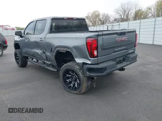 2021 GMC Sierra 1500 Elevation with VIN 3GTU9CED7MG289089, listed as a IAAI auction lot 41750582 with 63,351 mi miles and . Bid and sale history available at DreamBid. Image 3.