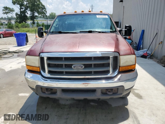 2000 Ford F-250 XL with VIN 1FTNX20L1YEB50589, listed as a Copart auction lot 63743775 with 105,448 mi miles and Salvage title. Bid and sale history available at DreamBid. Image 5.