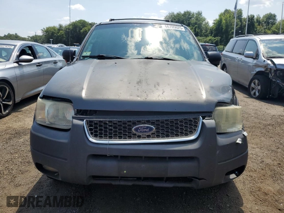 2002 Ford Escape XLT Choice with VIN 1FMYU04132KD84336, listed as a Copart auction lot 66705025 with 198,979 mi miles and Salvage title. Bid and sale history available at DreamBid. Image 5.