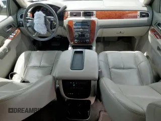 2014 Chevrolet Tahoe LT with VIN 1GNSCBE07ER239575, listed as a Copart auction lot 63094525 with 142,467 mi miles and Salvage title. Bid and sale history available at DreamBid. Image 8.