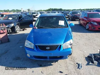 2005 Kia Spectra z VIN KNAFE161655144094, wystawiony jako IAAI lot #42220968 z przebiegiem 158 339 mil mil oraz . Historia ofert i sprzedaży dostępna na DreamBid. Obrazek 12.