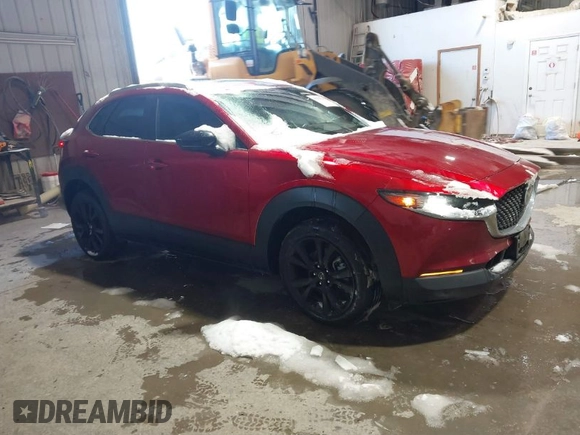 2022 Mazda CX-30 2.5 Turbo with VIN 3MVDMBAY5NM427943, listed as a IAAI auction lot 41585519 with 32,807 mi miles and . Bid and sale history available at DreamBid. Image 1.