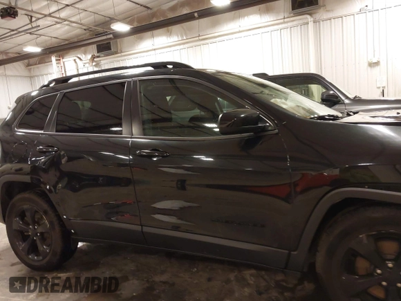 2016 Jeep Cherokee Latitude with VIN 1C4PJMCS9GW162734, listed as a IAAI auction lot 41940086 with 98,101 mi miles and . Bid and sale history available at carsss.com. Image 13.