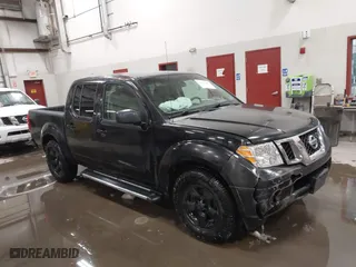 2009 Nissan Frontier SE with VIN 1N6AD07U59C401327, listed as a IAAI auction lot 41591067 with 203,043 mi miles. Bid and sale history available at carsss.com. Image 1.