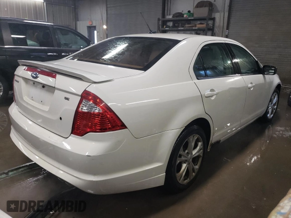 2012 Ford Fusion SE with VIN 3FAHP0HA3CR154966, listed as a Copart auction lot 44406335 with 171,194 mi miles and Salvage Title. Bid and sale history available at DreamBid. Image 3.