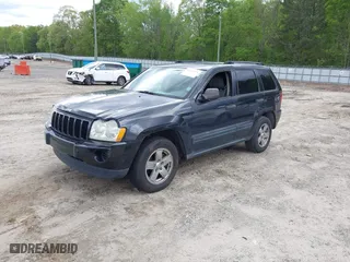 2005 Jeep Grand Cherokee Laredo with VIN 1J4GS48K65C570266, listed as a IAAI auction lot 42026624 with 162,512 mi miles. Bid and sale history available at carsss.com. Image 2.