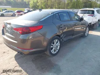 2012 Kia Optima LX with VIN 5XXGM4A7XCG069576, listed as a IAAI auction lot 41981909 with 189,080 mi miles. Bid and sale history available at carsss.com. Image 4.
