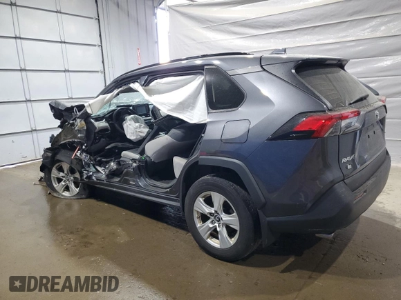 2019 Toyota RAV4 XLE with VIN 2T3P1RFV0KW059311, listed as a Copart auction lot 59777515 with Not provided miles and Salvage title. Bid and sale history available at DreamBid. Image 2.