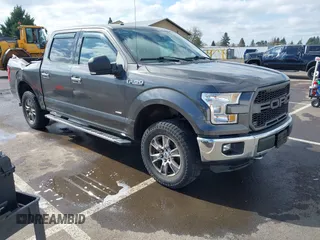 2015 Ford F-150 XLT with VIN 1FTEW1EG1FKE89277, listed as a IAAI auction lot 41752106 with 142,069 mi miles. Bid and sale history available at carsss.com. Image 1.
