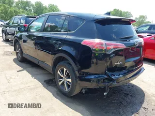 2018 Toyota RAV4 XLE with VIN 2T3WFREV3JW468450, listed as a IAAI auction lot 42528560 with 77,513 mi miles and . Bid and sale history available at DreamBid. Image 3.