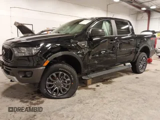 2023 Ford Ranger XL with VIN 1FTER4FH8PLE17858, listed as a IAAI auction lot 41710721 with 5,299 mi miles and . Bid and sale history available at DreamBid. Image 2.