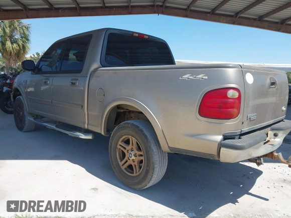 2002 Ford F-150 XLT with VIN 1FTRW08LX2KE43025, listed as a IAAI auction lot 42060641 with 123,507 mi miles. Bid and sale history available at carsss.com. Image 3.