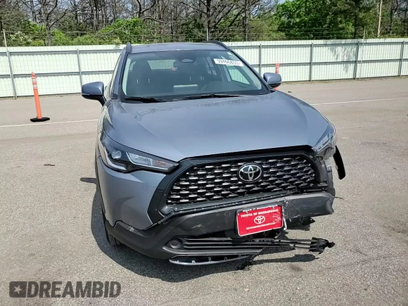 2023 Toyota Corolla Cross LE with VIN 7MUCAABG4PV054828, listed as a Copart auction lot 59466855 with 23,884 mi miles and Salvage title. Bid and sale history available at DreamBid. Image 14.