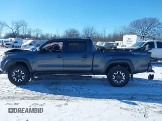 2017 Toyota Tacoma SR5 with VIN 3TMDZ5BN1HM021199, listed as a IAAI auction lot 41387400 with 93,392 mi miles. Bid and sale history available at carsss.com. Image 13.