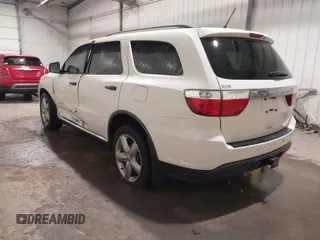 2012 Dodge Durango Citadel with VIN 1C4RDJEG9CC252663, listed as a IAAI auction lot 41260875 with 126,128 mi miles and . Bid and sale history available at DreamBid. Image 3.