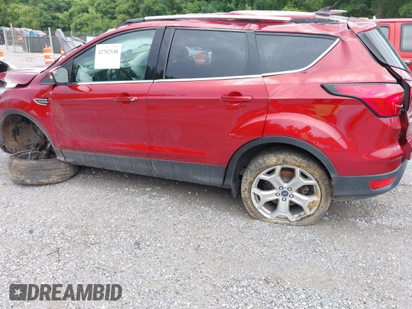 2019 Ford Escape Titanium with VIN 1FMCU9J97KUC08287, listed as a IAAI auction lot 42702548 with 45,207 mi miles and . Bid and sale history available at DreamBid. Image 14.