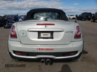 2012 MINI Roadster S z VIN WMWSY3C57CT144767, wystawiony jako Copart lot #76274884 z przebiegiem 44 896 mil mil oraz Tytuł czysty. Historia ofert i sprzedaży dostępna na DreamBid. Obrazek 6.