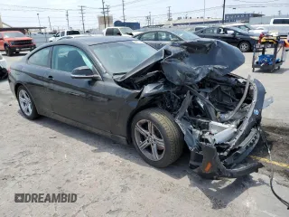 2014 BMW 4 Series 428i xDrive z VIN WBA3N9C56EF722472, wystawiony jako Copart lot #59873185 z przebiegiem 129 926 mil mil oraz Szkoda całkowita • Salvage title. Historia ofert i sprzedaży dostępna na DreamBid. Obrazek 4.