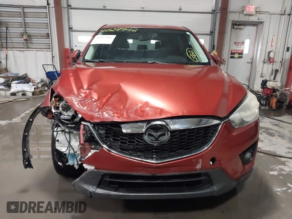 2013 Mazda CX-5 Grand Touring with VIN JM3KE2DE3D0120609, listed as a IAAI auction lot 41527942 with 215,176 mi miles. Bid and sale history available at carsss.com. Image 12.