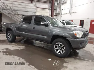 2014 Toyota Tacoma z VIN 3TMMU4FN6EM069828, wystawiony jako IAAI lot #41495264 z przebiegiem 133 338 mil mil oraz . Historia ofert i sprzedaży dostępna na DreamBid. Obrazek 1.